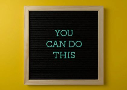 Inspirational message 'You Can Do This' displayed on a blackboard with a bold yellow backdrop.